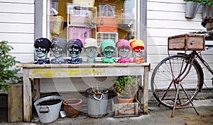 Mannequin glass head in front of shop in Henningsvaer on the Lofoten in Norway