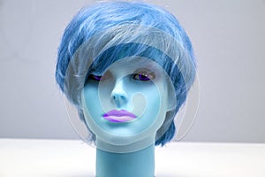 Mannequin head with blue wig