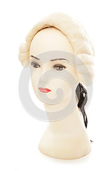 Mannequin head wearing judge wig