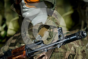 Mannequin in military uniform soldier in a helmet