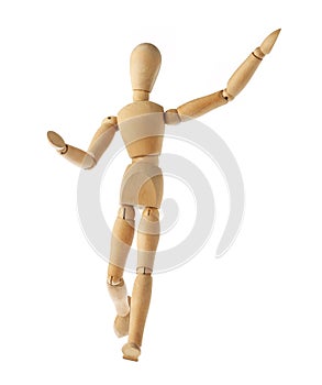 Mannequin old wooden dummy acting about soccer isolated on white
