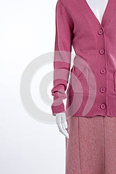 Mannequin in pink garment, copy space.