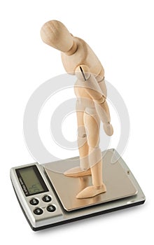 Mannequin standing on the digital scale