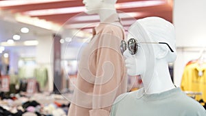 Mannequin with sun glass in shopping mall photo