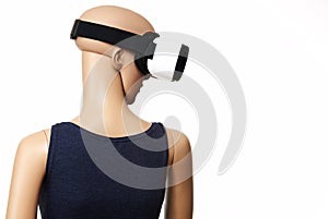 Mannequin with virtual reality glasses on white background