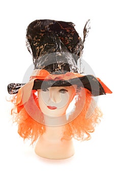 Mannequin wearing Mad hatter tea party hat and wig