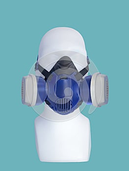 Mannequin wearing protective dust mask
