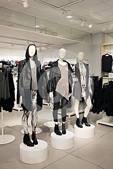 Mannequins in a clothing store dressed in edgy, punk style