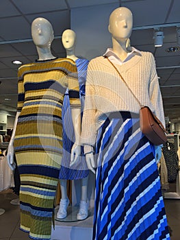 Mannequins displaying the latest fashions in a shop