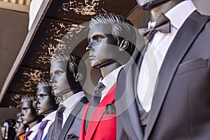 Mannequins in dress suits and ties