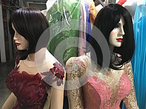 Mannequins in evening dresses