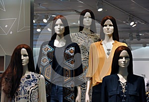 Mannequins in fashion clothing shop