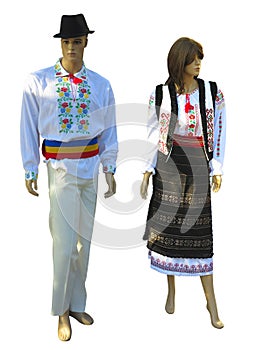 Mannequins in national traditional balkanic, moldavian, romanian costumes isolated over white