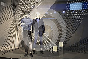 mannequins standing in the shop window Display casual man clothing store in the Mall
