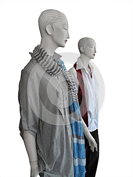 Mannequins wearing shirts and scarves