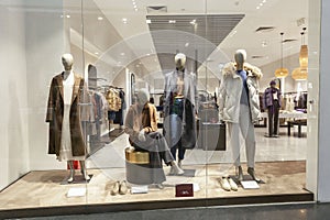 Mannequins in a women's clothing store. Style, fashion and beauty. Front view