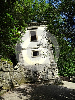 The Inclining House in the forest of Bomarzo. Italy photo