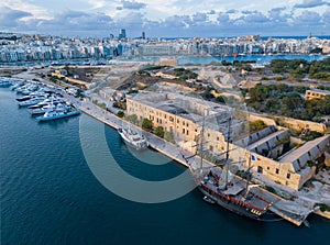 Manoel Island Lazarreto sunset with beautiful old sailing ship aerial