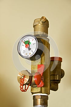 Manometer and armature