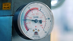 Manometer with arrow close up. Industrial equipment for measurement