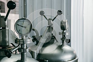 Manometer on iron machine vat, brewery equipment, beer manufacturing technology