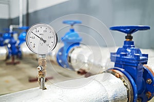 Manometer pipes and valve in water pump station