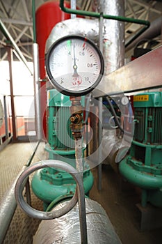 Manometer showing level of steam pressure inside of the steam generation vessel