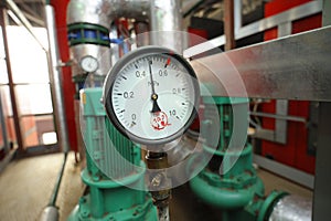 Manometer showing level of steam pressure inside of the steam generation vessel