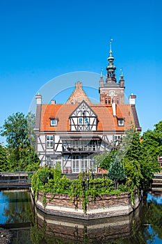 Manor of the Guild of Millers by the Radunia river in Gdansk at daylight. Poland Europe. Half-timbered building built on the north