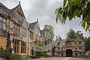 Manor House built in Jacobean period architecture 1630 in guiting yellow stone, in the Cotswold village of Stanway Gloucestershire