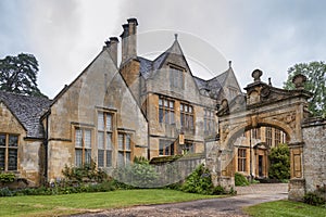 Manor House built in Jacobean period architecture 1630 in guiting yellow stone, in the Cotswold village of Stanway Gloucestershire