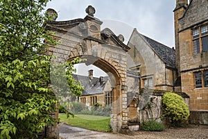 Manor House built in Jacobean period architecture 1630 in guiting yellow stone, in the Cotswold village of Stanway Gloucestershire