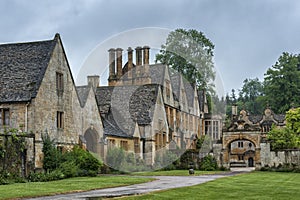 Manor House built in Jacobean period architecture 1630 in guiting yellow stone, in the Cotswold village of Stanway Gloucestershire