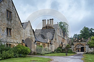 Manor House built in Jacobean period architecture 1630 in guiting yellow stone, in the Cotswold village of Stanway Gloucestershire