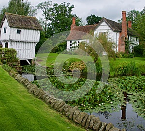 Manor house gatehouse and the water