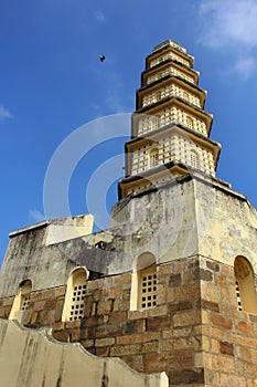 Manora fort tower with battlement and window.