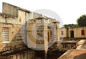 The Manora fort tower with entrance path with trench.