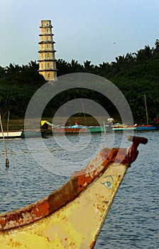 Manora fort tower with small fisher mans harbor.