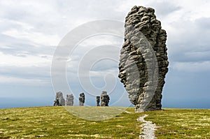 Manpupuner rock formations. Weathered stone pillars. Famous nature landmark of Ural mountains, Komi Republic, Russia