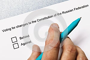 Mans hand and text form. The Concept of Voting for Constitutional Changes in the Russian Federation