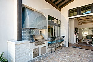 Mansion home outdoor plaza patio barbeque photo