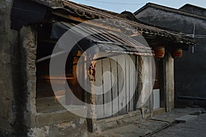 Mansion quiet life. Beautiful afternoon.Chinese Mansion portrayal of life.The old store closed