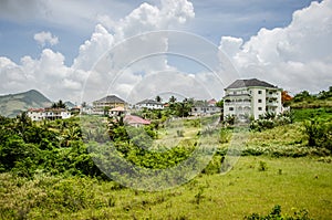 Mansions on green hillside