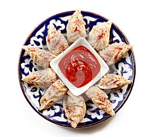 Manta rays on a plate on white background.