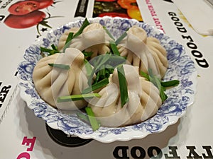 Manti with spring onions