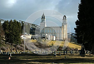 Manti Utah Mormon LDS Temple early spring showing adjacent cemetery