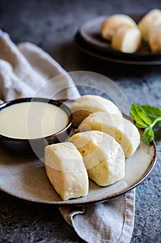 Mantou - Chinese steamed buns served with sweetened condensed mi