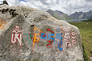 Mantra written in Tibetan script photo