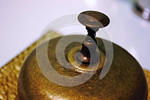 manual bell used in receptions to alert