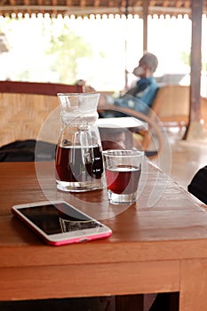 Manual brew coffe. Fresh morning filter coffee blooming in the dripper